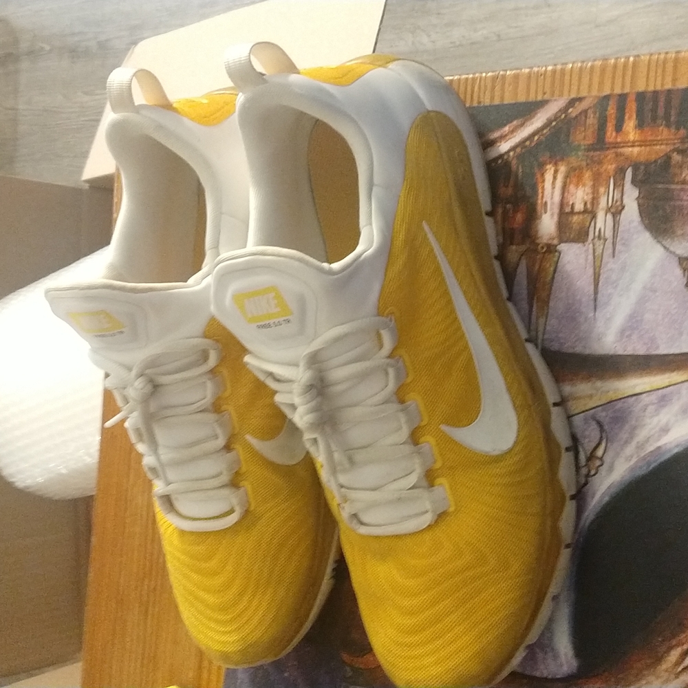 Men's yellow Nike sneakers